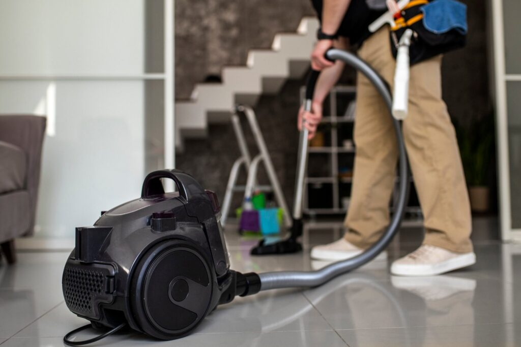 man-doing-professional-home-cleaning-service-1-scaled