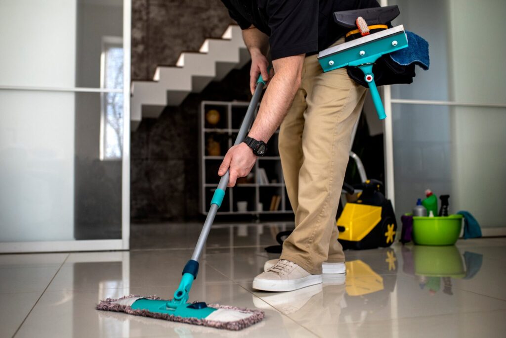 man-doing-professional-home-cleaning-service-scaled